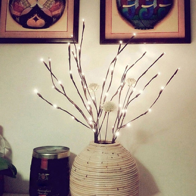 Warm white Christmas LED lights with 20 floral-shaped bulbs on a 30-inch battery-powered string