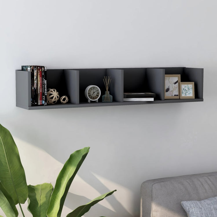 White chipboard CD wall shelf with four open compartments for media storage