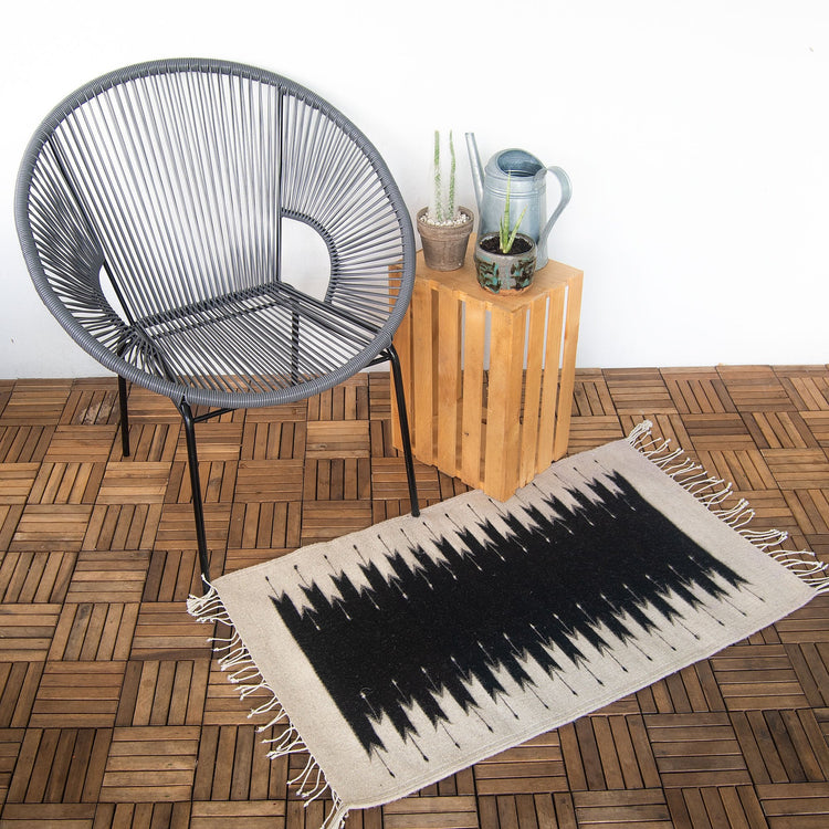 Handmade Southwestern style rug with lightning pattern, crafted on waist loom using 100% wool by artisans from Oaxaca, Mexico.