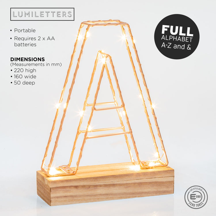 Light up letter H made from rose gold copper wire with LED lights and wooden base