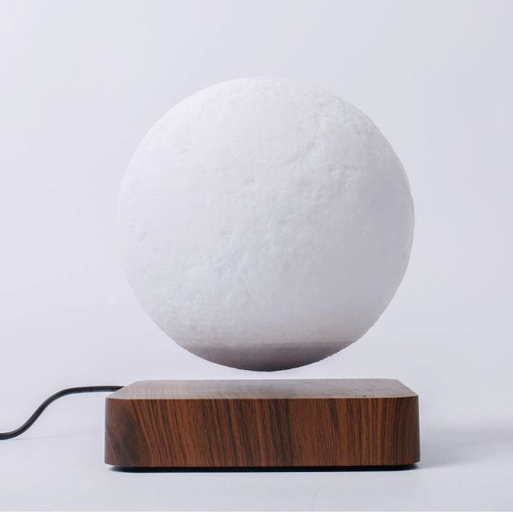 Floating moon lamp with 3D magnetic levitation and wireless LED light for home decor or gifting