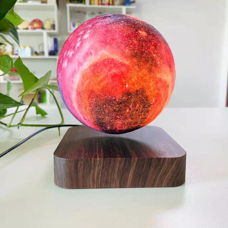 Levitating moon lamp with 3D printed lunar surface, LED lighting, and touch control for bedrooms, offices, and decorative spaces