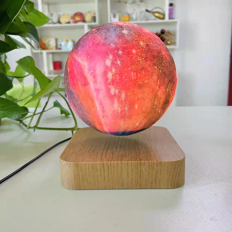 Levitating moon lamp with 3D printed lunar surface, LED lighting, and touch control for bedrooms, offices, and decorative spaces