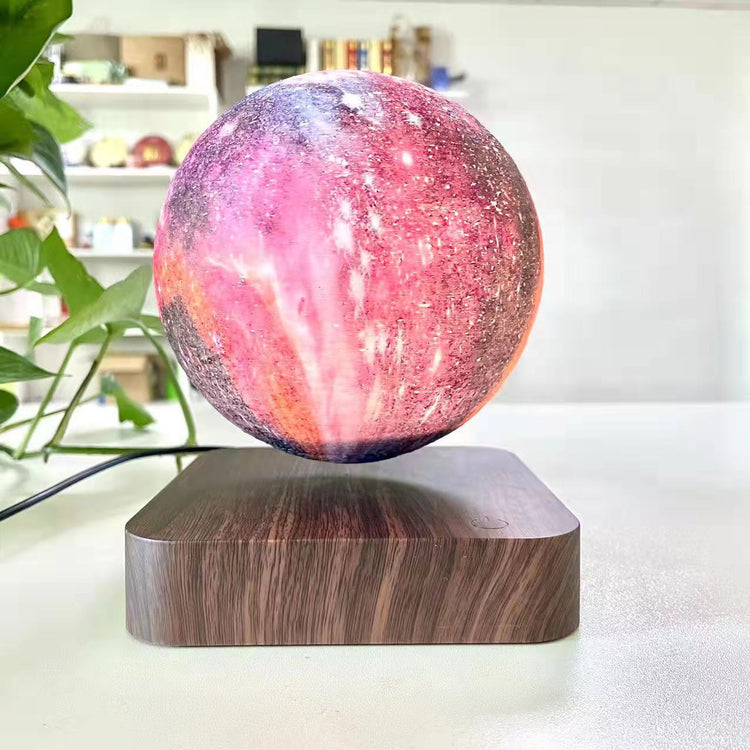 Levitating moon lamp with 3D printed lunar surface, LED lighting, and touch control for bedrooms, offices, and decorative spaces