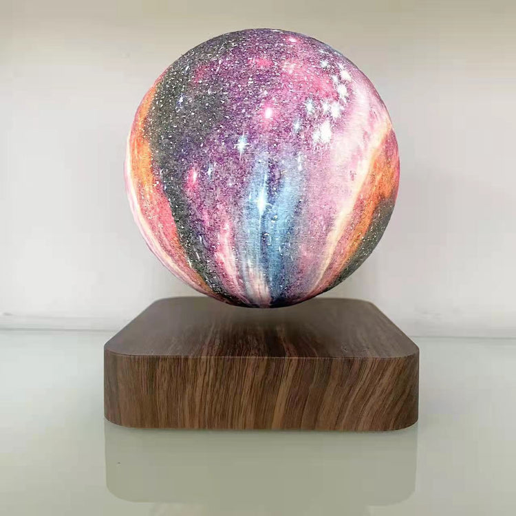 Levitating moon lamp with 3D printed lunar surface, LED lighting, and touch control for bedrooms, offices, and decorative spaces
