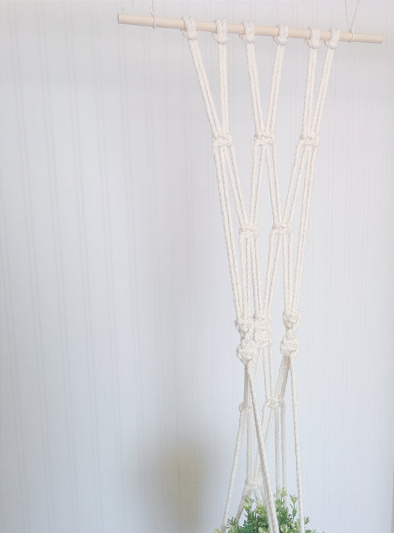 Handmade macrame plant hanger with Aquamarine dip-dye, crafted from cotton rope, ideal for indoor small pots and modern boho home decor.