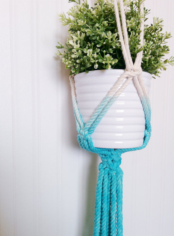 Handmade macrame plant hanger with Aquamarine dip-dye, crafted from cotton rope, ideal for indoor small pots and modern boho home decor.