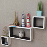 6-piece black and white wall cube shelves mounted in creative layout on white wall