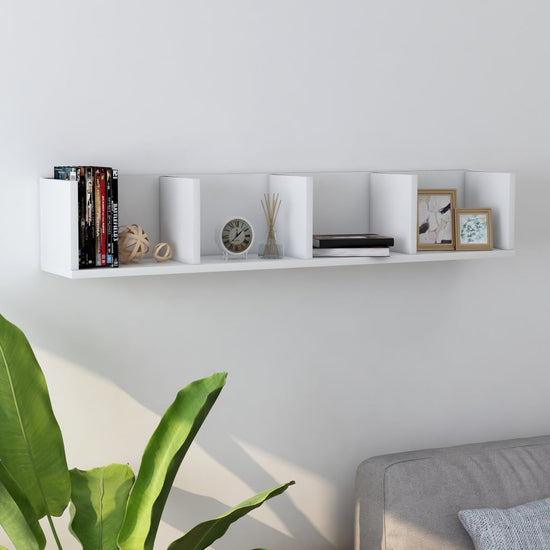 White chipboard CD wall shelf with four open compartments for media storage