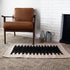 Handmade Southwestern style rug with lightning pattern, crafted on waist loom using 100% wool by artisans from Oaxaca, Mexico.