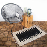 Handmade Southwestern style rug with lightning pattern, crafted on waist loom using 100% wool by artisans from Oaxaca, Mexico.