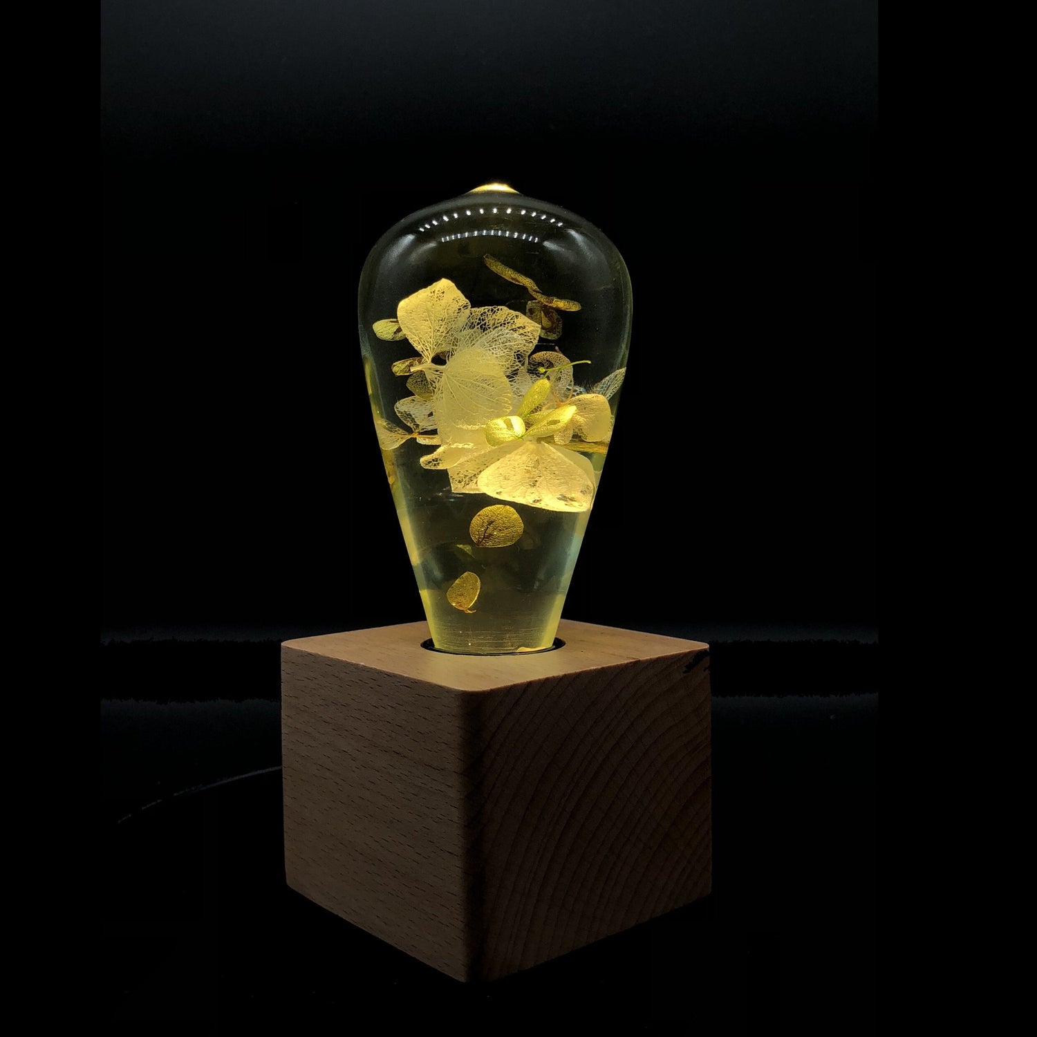 Handmade white hydrangea resin table lamp with wooden base and LED bulb