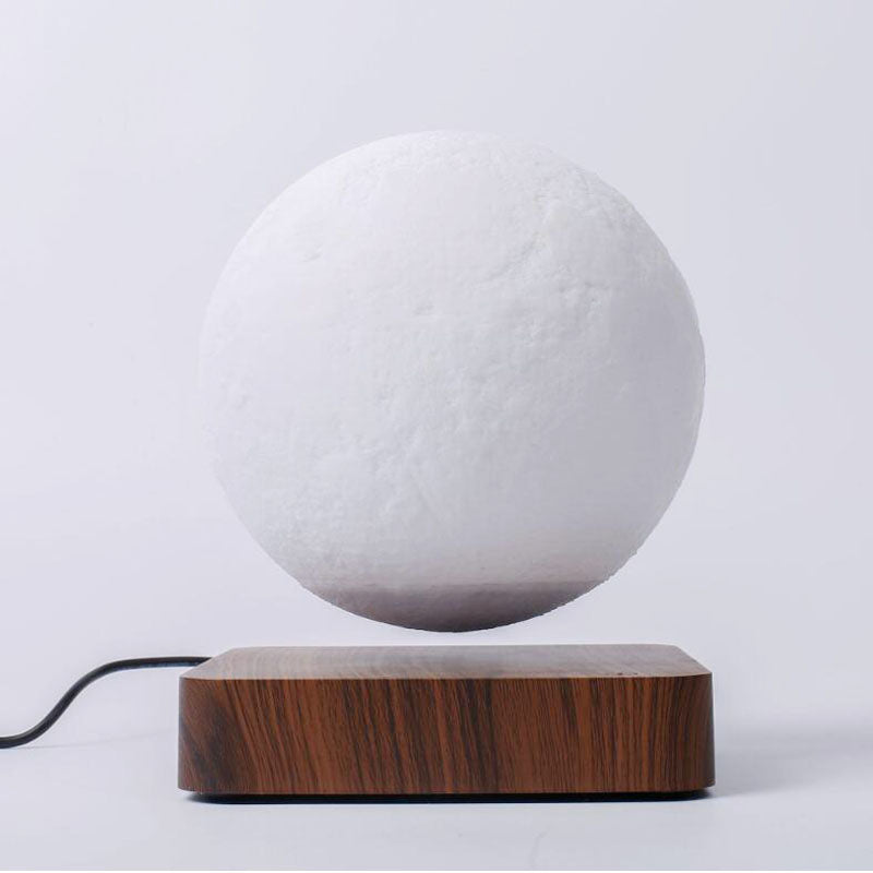 Floating moon lamp with 3D magnetic levitation and wireless LED light for home decor or gifting