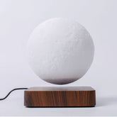 Floating moon lamp with 3D magnetic levitation and wireless LED light for home decor or gifting