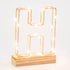Light up letter H made from rose gold copper wire with LED lights and wooden base
