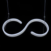 Modern LED ceiling light with swirl-shaped acrylic design and adjustable hanging wire, perfect for living rooms, dining rooms, or modern spaces
