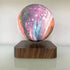 Levitating moon lamp with 3D printed lunar surface, LED lighting, and touch control for bedrooms, offices, and decorative spaces